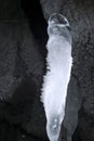 Ice stalagmite in the cave